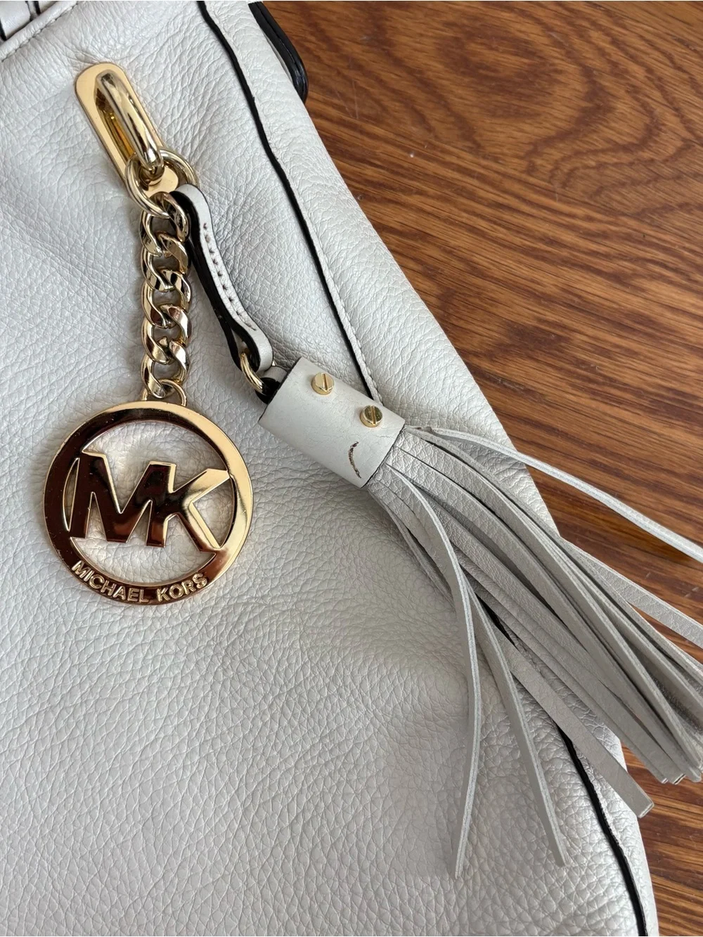Michael Kors quiet luxury Cream Pebbled Leather Tassel Hobo Bag purse gold trim